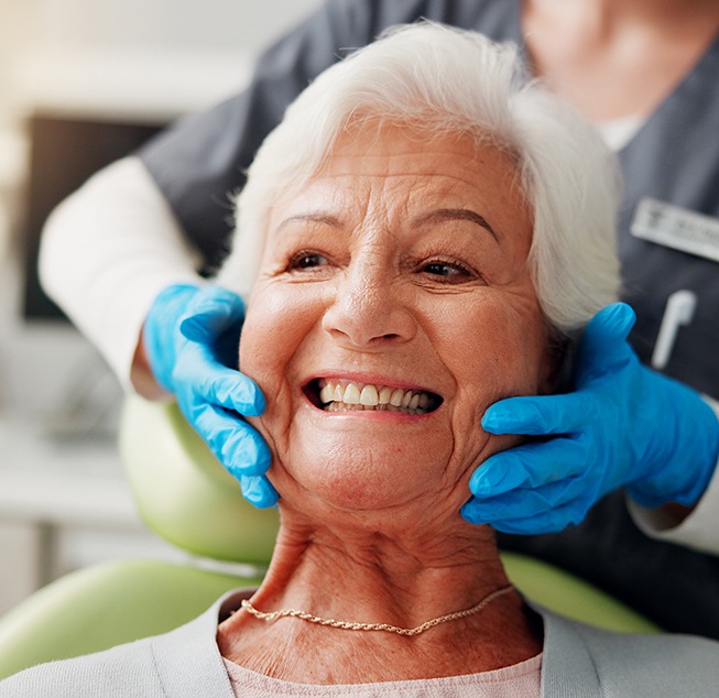 Patient in Hanford smiling confidently after receiving dentures 